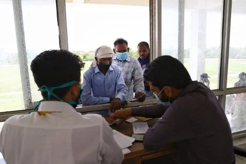 Migrant workers Stock Photos