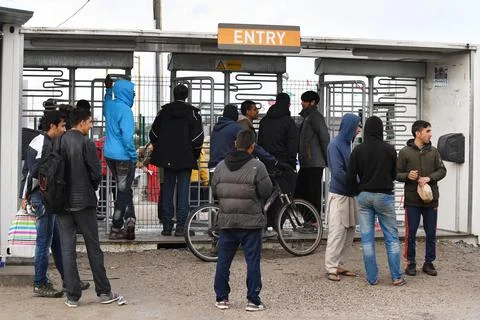 Migrants Queue Up To Be Registered To Have Their Rights To Asylum Status Transfe Stock Photos