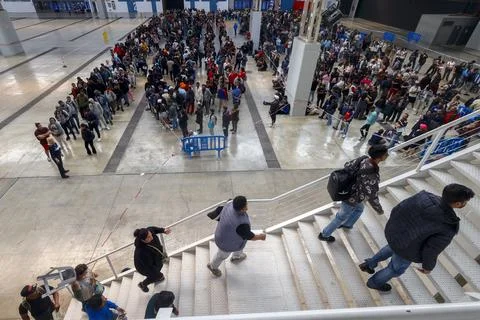 Migrants queue to obtain documents needed for their regularization, Lhospitalet  스톡 사진