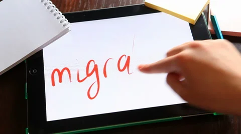 Migration - hand write word on tablet, migrants concept 動画素材 62961465