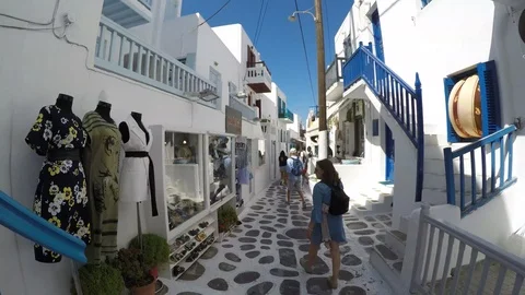 Mikonos timewarp walking through the streets and little stores Stock Footage 97576148