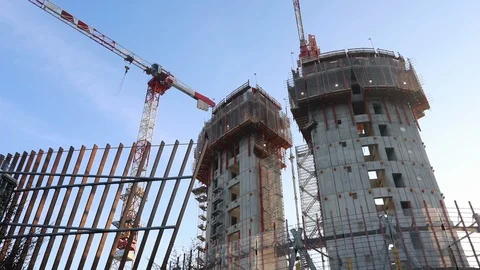 Milan big construction site with crane and blue sky on the background 스톡 동영상 124238724