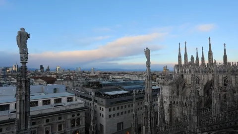 Milan cityscape top view time lapse shot over the Duomo terraces Video stock 124168863