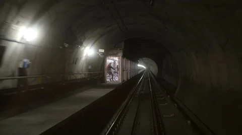 Milan metro train subway arrival - traffic Italy automatic train without driver Stock Footage 63296878