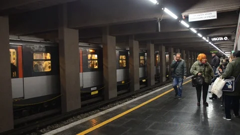 Milan Metropolitan train system, train carriage arriving and leaving platform Stock Footage 98737587