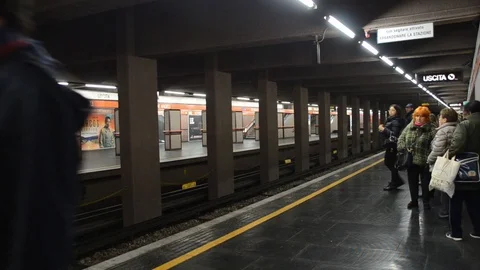 Milan Metropolitan train system, train carriage arriving and leaving platform Stock Footage 98737632