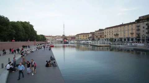 Milan new Darsena, redeveloped docks area in the afternoon with people Stock Footage 64180702