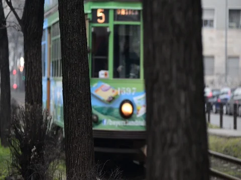 Milan tram arrives at the stop Stock Footage 71982507