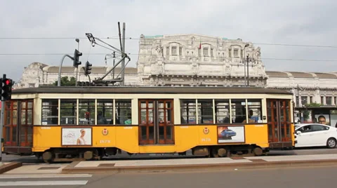 Milan: tram passing in front of central train station Stock Footage