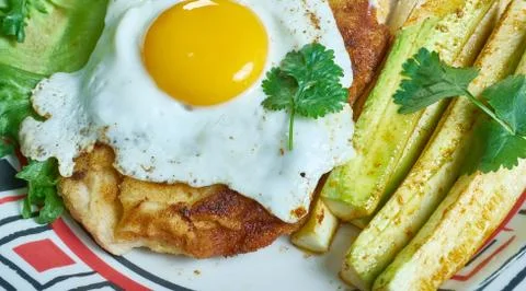 Milanesa a caballo Stock Photos