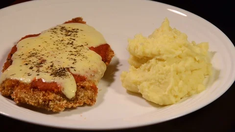 Milanesa Napolitana being served, Stock Video Pond5