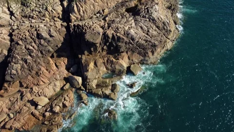 Mild Ocean Waves Flowing Over Rocks – Drone Footage Stock Footage 270363102