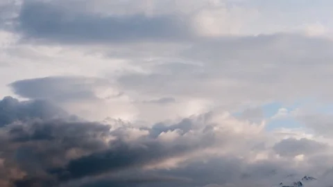 Mild warm clouds moving fast timelapse Stock Footage 84474800