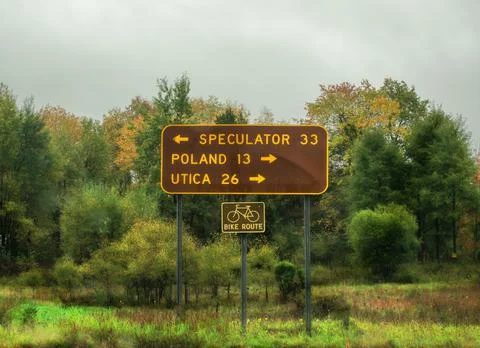 Mileage sign in the Adirondack Mountains Stock Photos