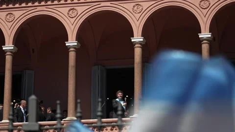 Milei waves from Casa Rosada Stock Footage 258369427
