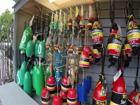 Miles Marker zero and Southern Most Point souvenirs in Mallory Square shoppin Stock Footage 80470738