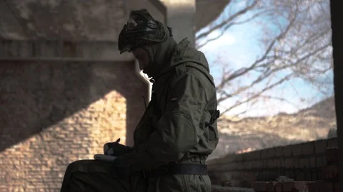 The militant takes notes in a notebook, war, hostilities Stock Footage 101690297