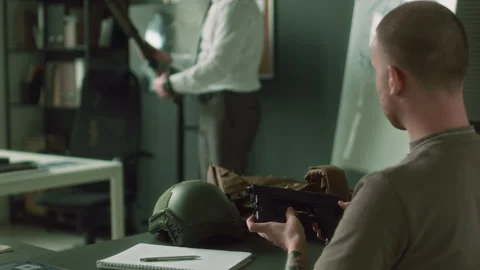 Military Academy Student Analyzing Usage of Hand Gun During Class Vídeos de archivo 257796048