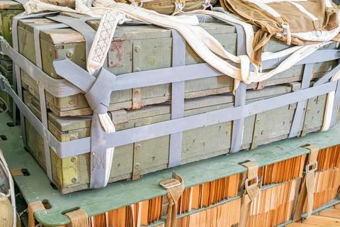 Military ammunition crate, containing multiple shells with bullet base resemb Stock Photos