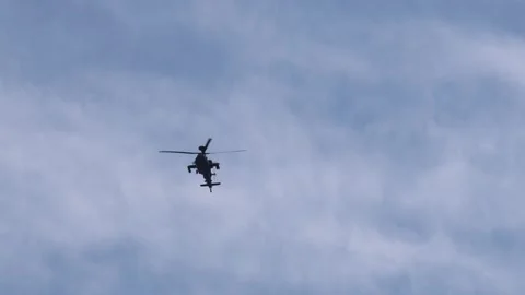 Military Apache attack helicopter flying over 動画素材 312249025
