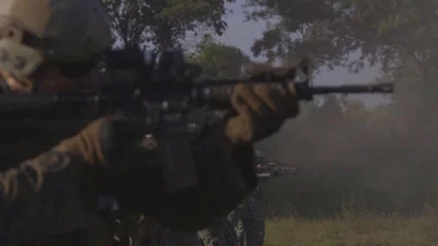 The military are lined up in one row and firing at targets Stock Footage 120732652