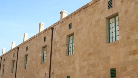 Military barracks facade fort st elmo green shutter windows chimney stacks Vídeo Stock 341774576
