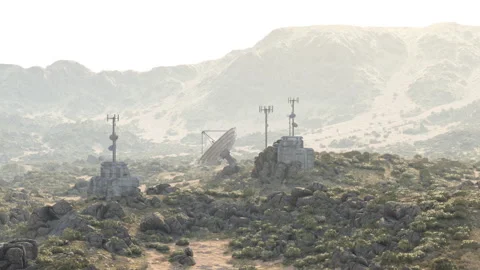 Military base situated in the mountains with communication towers and equipment Stock Footage 286346795