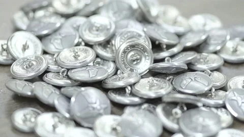 Military buttons on table Video stock 69144253