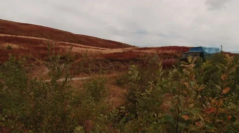 Military car down the mountain Stock Footage 68943949