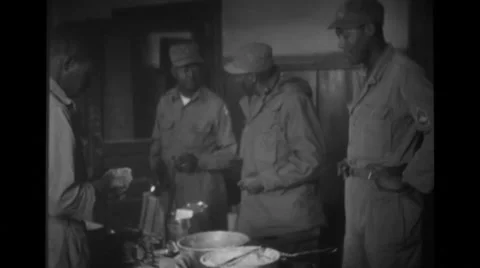 Military chaplain talking to soldiers Stock Footage 36425501