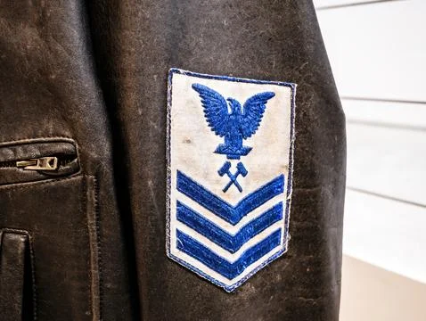 Military Chevron Patch on Leather Jacket Stock Photos