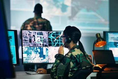 Military command center, computer screen and woman in surveillance, headset and Stock Photos