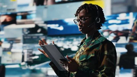 Military commander in war communicating enemy activity to troops Stock Photos