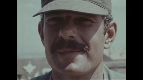 Military commission delegates chat with each other at headquarters - 1973 Video stock 99908352