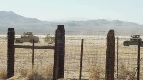 Military convoy humvee hummer desert warfare middle east  Stock Footage