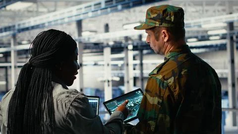 Military data center engineers using AI machine learning radar software Stock Photos