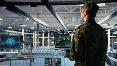 Military data center expert using ballistic missiles radar on laptop Stock Footage 314803523