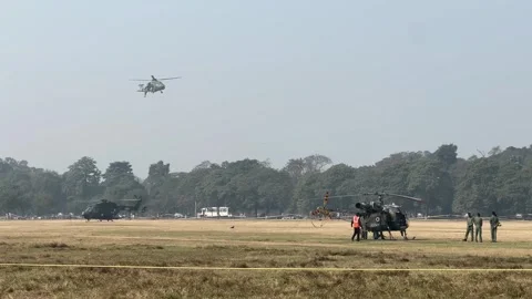 Military drills of choppers taking place at maidan in Kolkata, India. Stock Footage 300533053