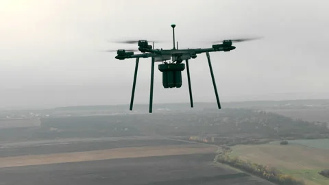 A military drone that lifts shells. Drones used in war Stock Footage