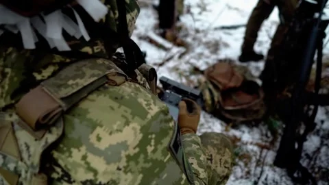 A military drone operator controls a drone at a military training ground Stock-Footage 290095190
