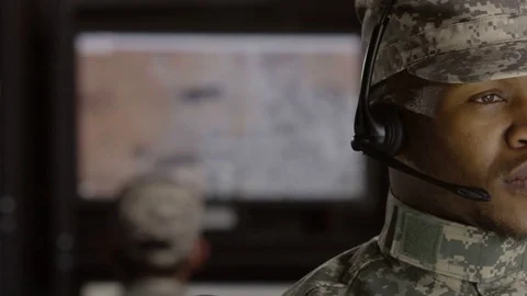 Military drone operator operator reading his computer, close up Stock-Footage 70071779