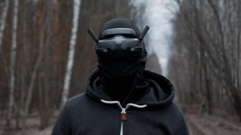 Military drone operator at war, preparing for flight, filming in forest Stock Photos