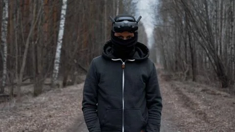 Military drone operator at war, preparing for flight, filming in forest Stock Photos