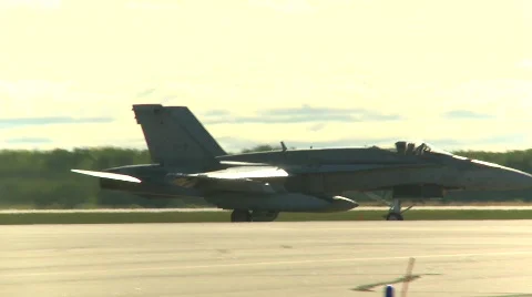 Military, F18 Hornet fighter jet taxi follow shot medium tight Stock Footage