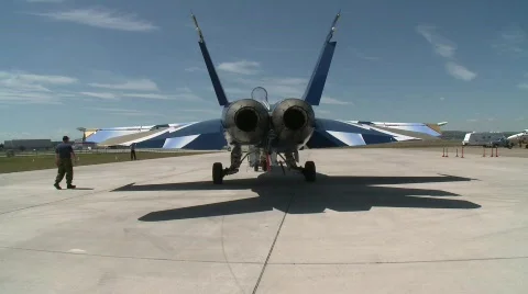 Military, F18 Hornet fighter jet being towed Stock Footage