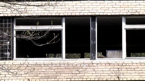 Military hand grenade explosion on background of destroyed house. Stock Footage 93811017