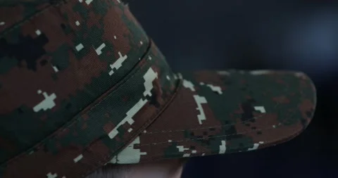 Military hat on head 2 Vídeo Stock 332573290