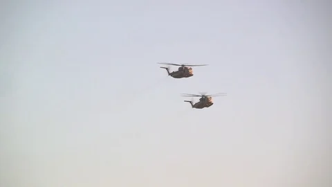 Military helicopter in action Stock Footage 76917653