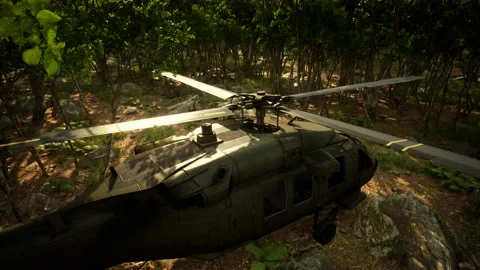 Military helicopter in deep jungle Stock Footage