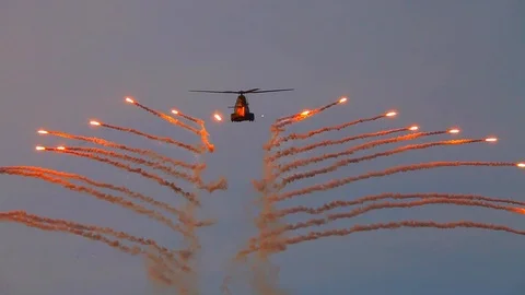 Military helicopter doing stealth evasive maneuvers Video stock 86513088